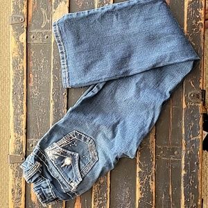 . Rhinestone and beaded embellishments.